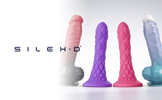 SILEXD lineup of realistic dildos in pastel colors, brand banner